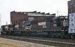 NS 9072, 9195, and 6690 lead a train onto the "H" line